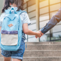 young girl attending new school.jpg.crdownload young girl attending new school.jpg.crdownload
